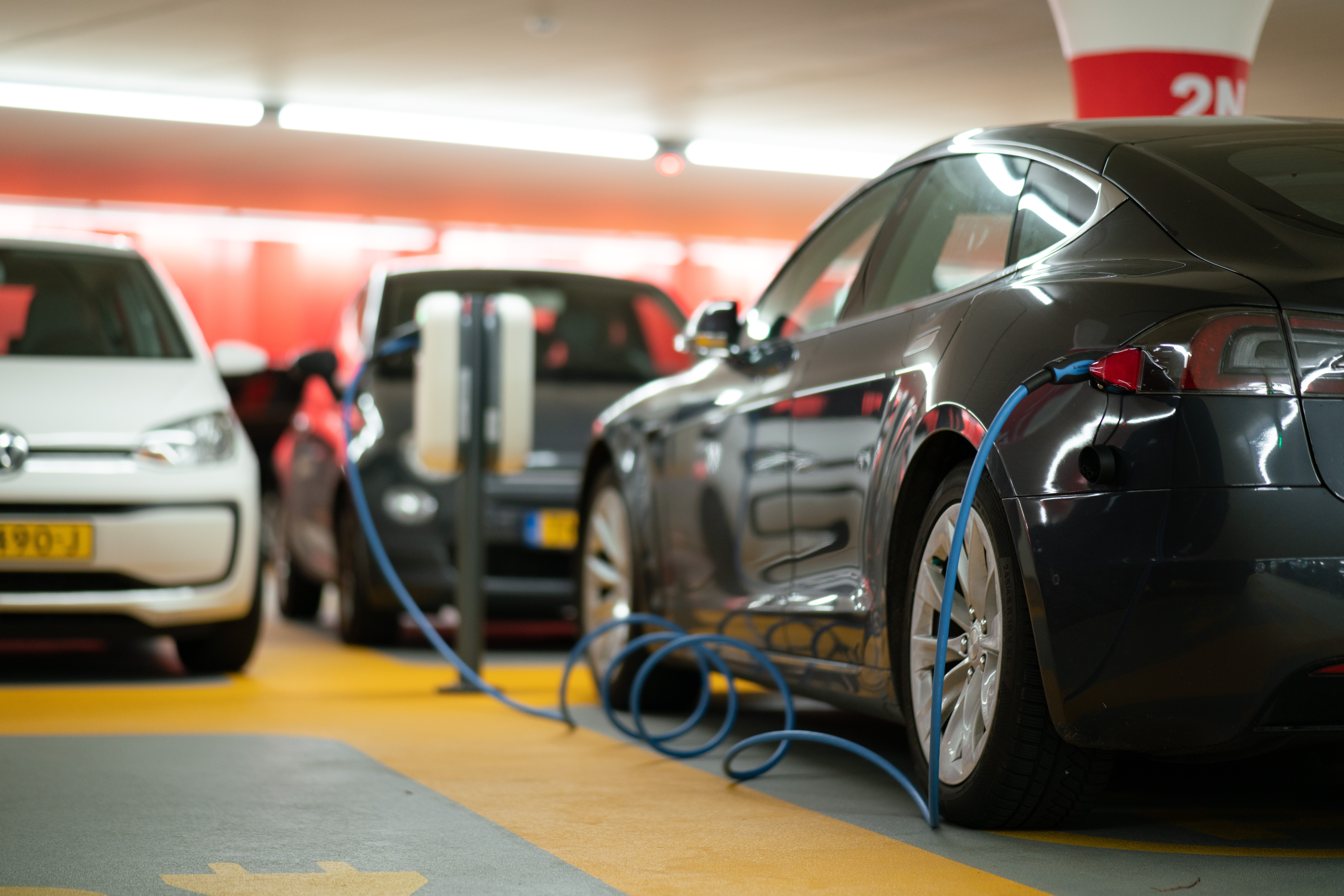 electric vehicles charging in a garage